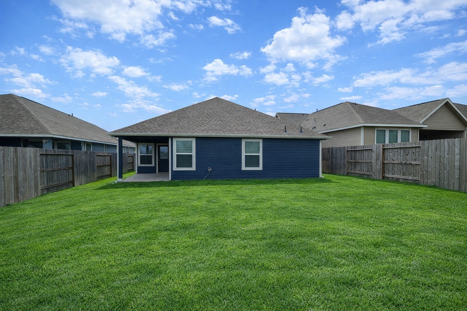 33118 School Hl Road Fulshear, TX 77441 - Photo 21 of 21 a view of a house with a yard