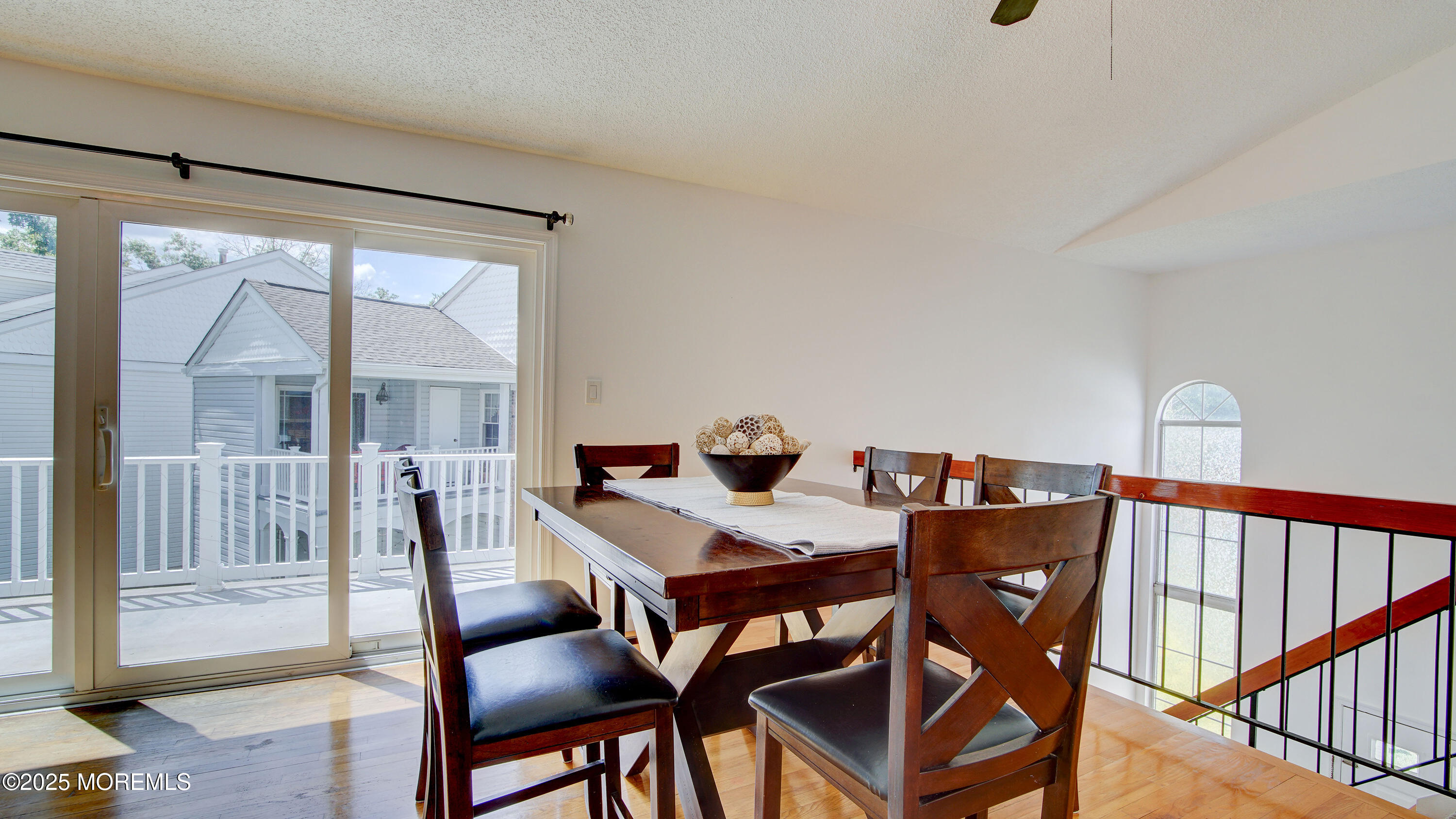 316 Tulip Lane Freehold, NJ 07728 - Photo 14 of 39 a view of a dining room with furniture window and wooden floor