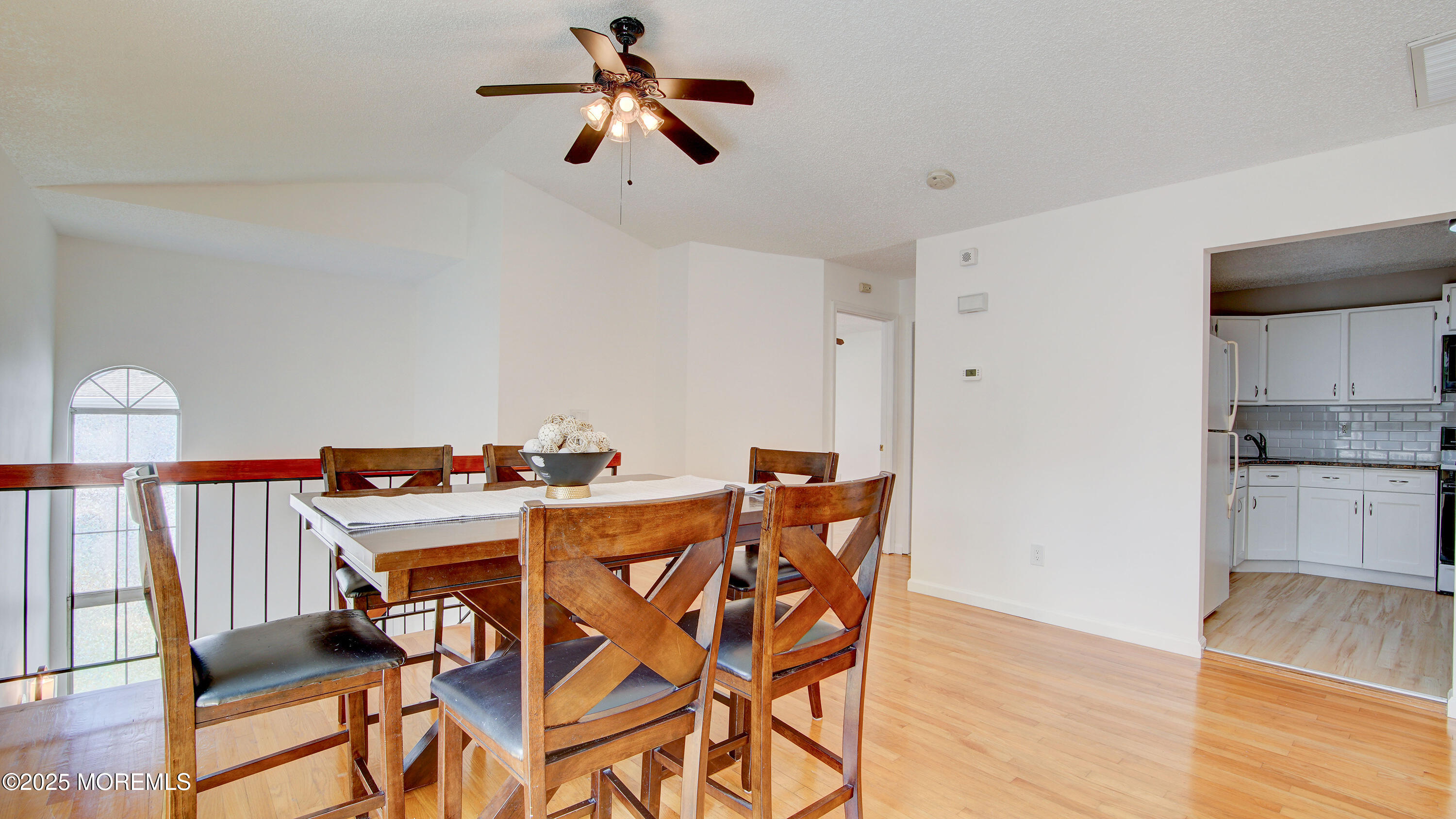 316 Tulip Lane Freehold, NJ 07728 - Photo 15 of 39 a view of a dining room with furniture and wooden floor