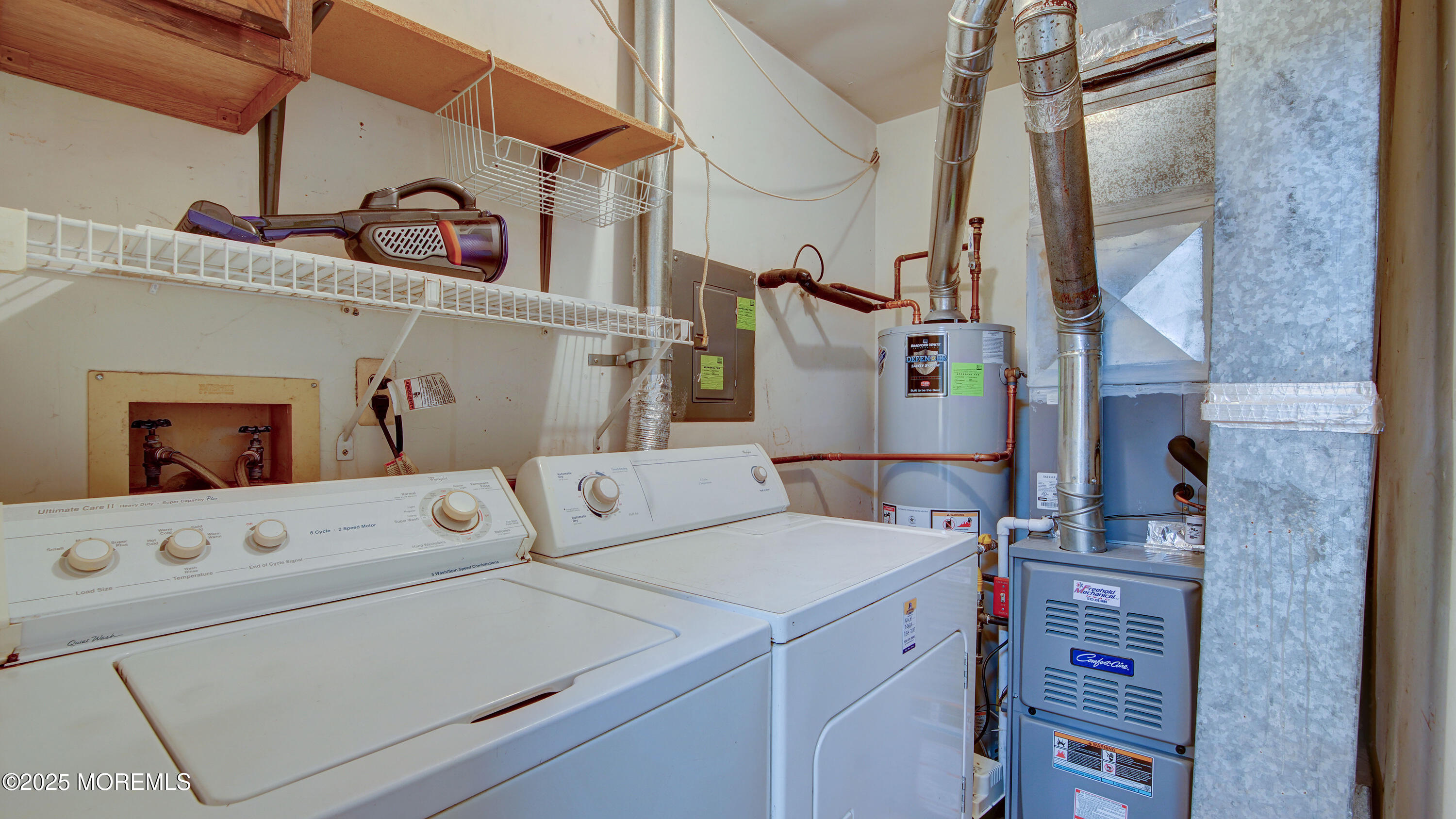 316 Tulip Lane Freehold, NJ 07728 - Photo 20 of 39 a utility room with dryer and washer