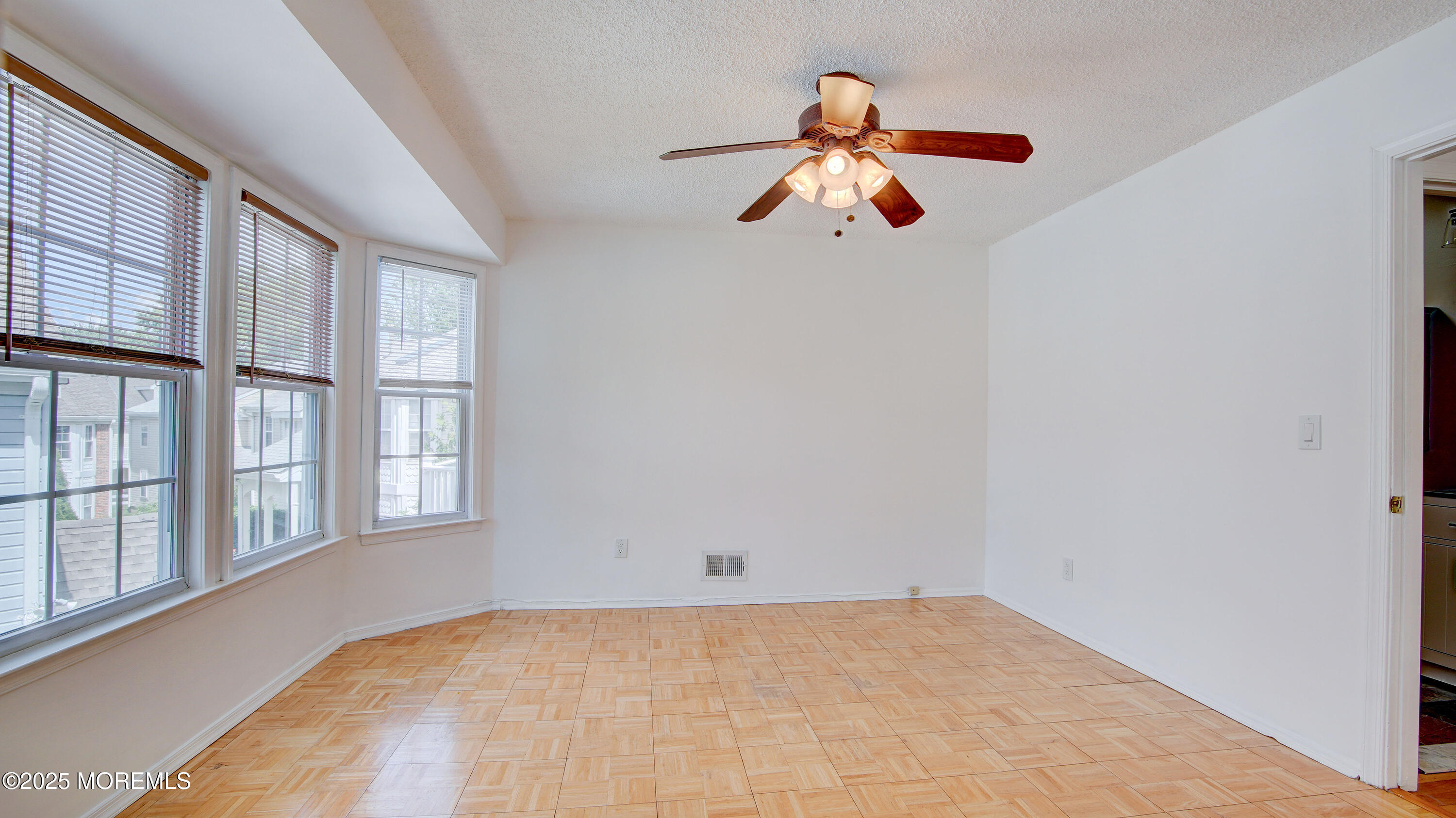 316 Tulip Lane Freehold, NJ 07728 - Photo 30 of 39 a view of an empty room with a window