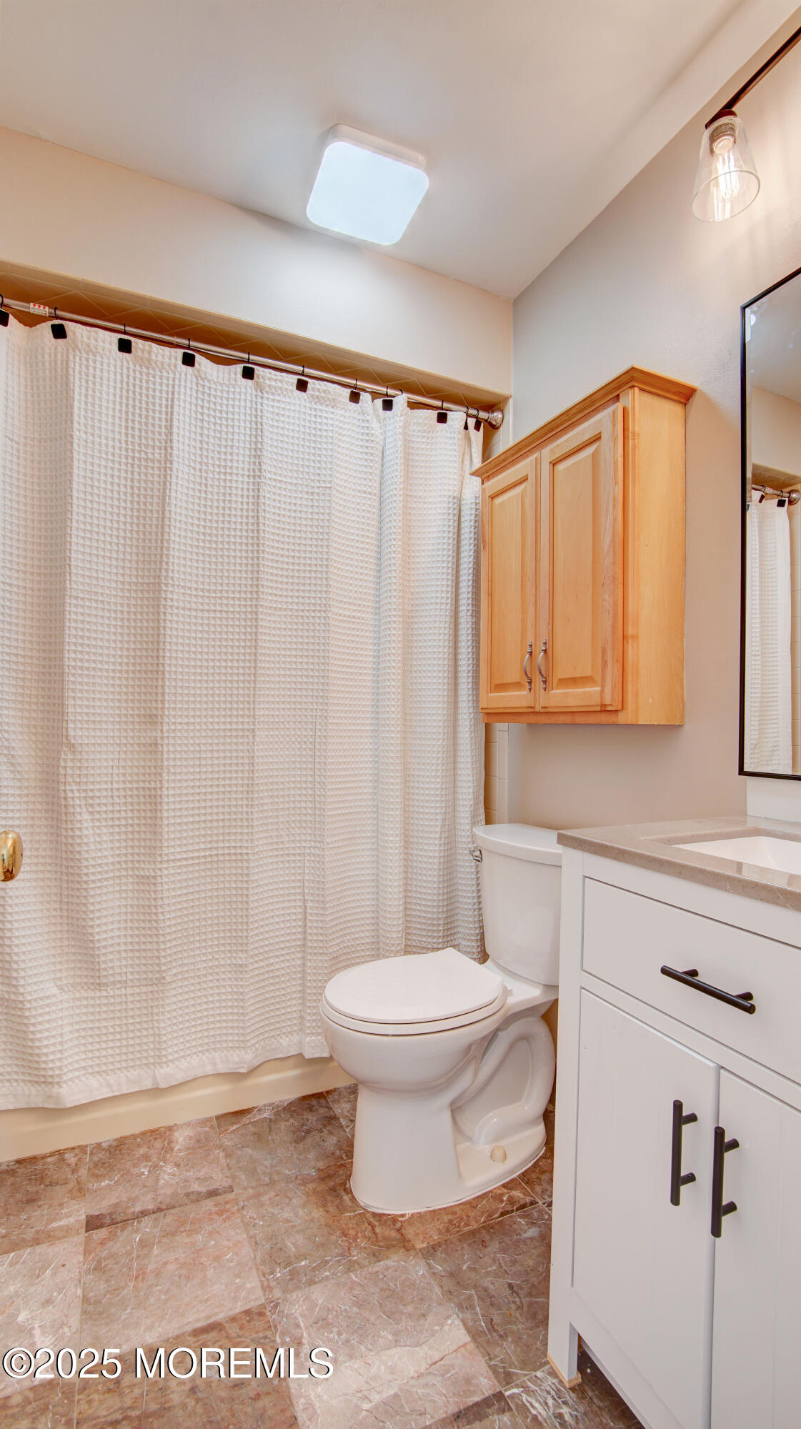 316 Tulip Lane Freehold, NJ 07728 - Photo 33 of 39 a bathroom with a toilet a sink and a shower