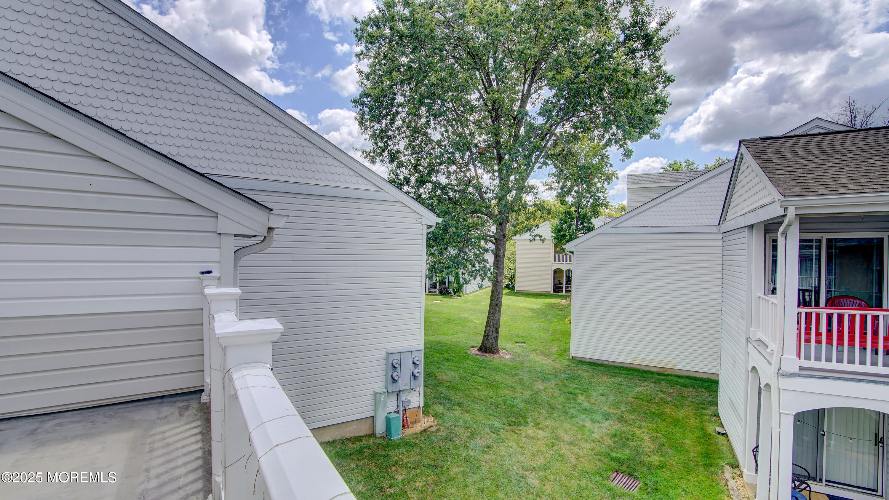316 Tulip Lane Freehold, NJ 07728 - Photo 36 of 39 a backyard of a house with seating space