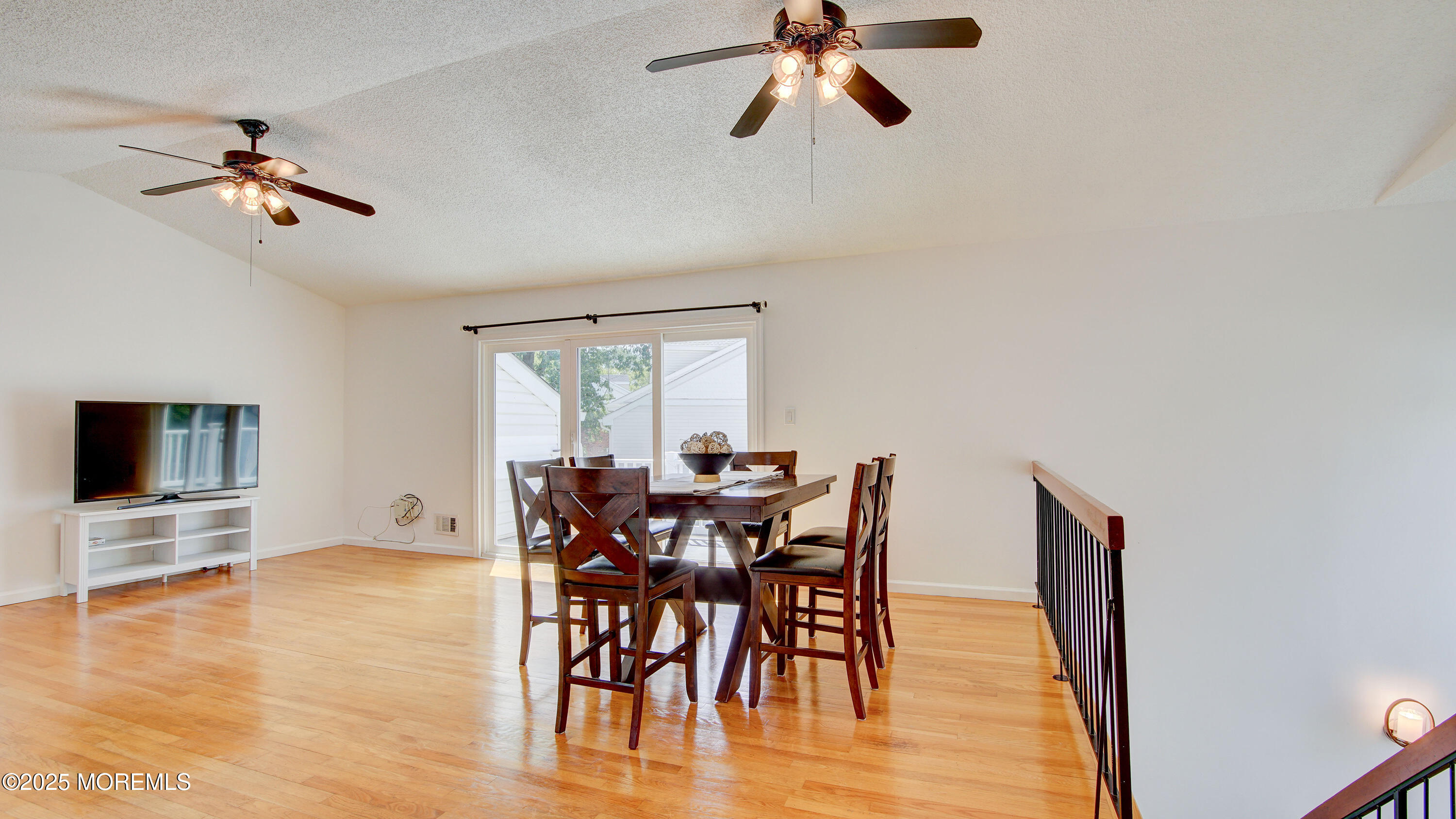 316 Tulip Lane Freehold, NJ 07728 - Photo 7 of 39 a view of a dining room with furniture and wooden floor