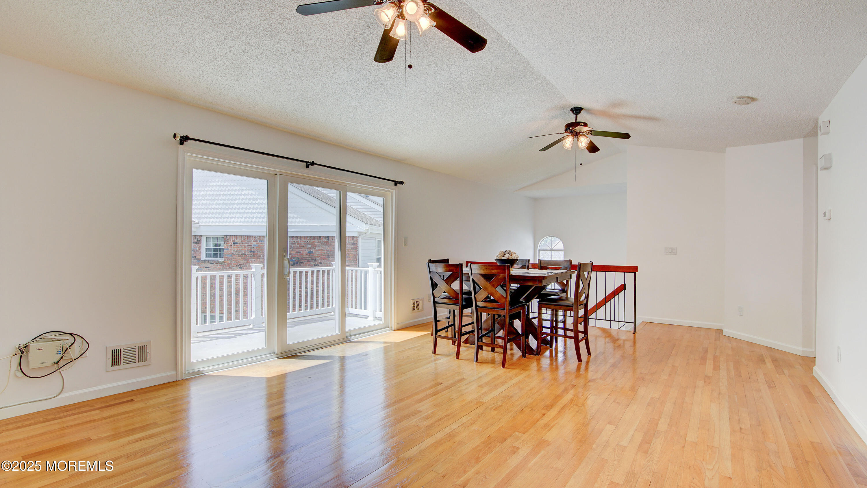 316 Tulip Lane Freehold, NJ 07728 - Photo 9 of 39 a view of a dining room with furniture window and wooden floor