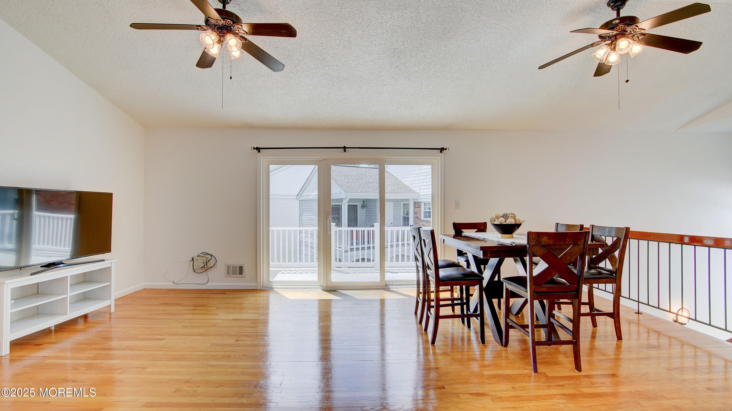 316 Tulip Lane Freehold, NJ 07728 - Photo 10 of 39 a view of a dining room with furniture and wooden floor