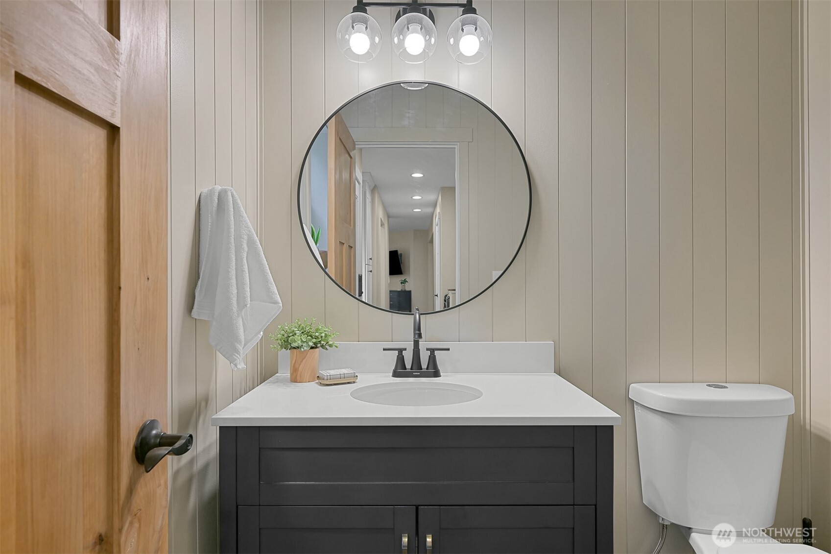 9111 Custer School Road Custer, WA 98240 - Photo 19 of 40 a bathroom with a sink and a mirror