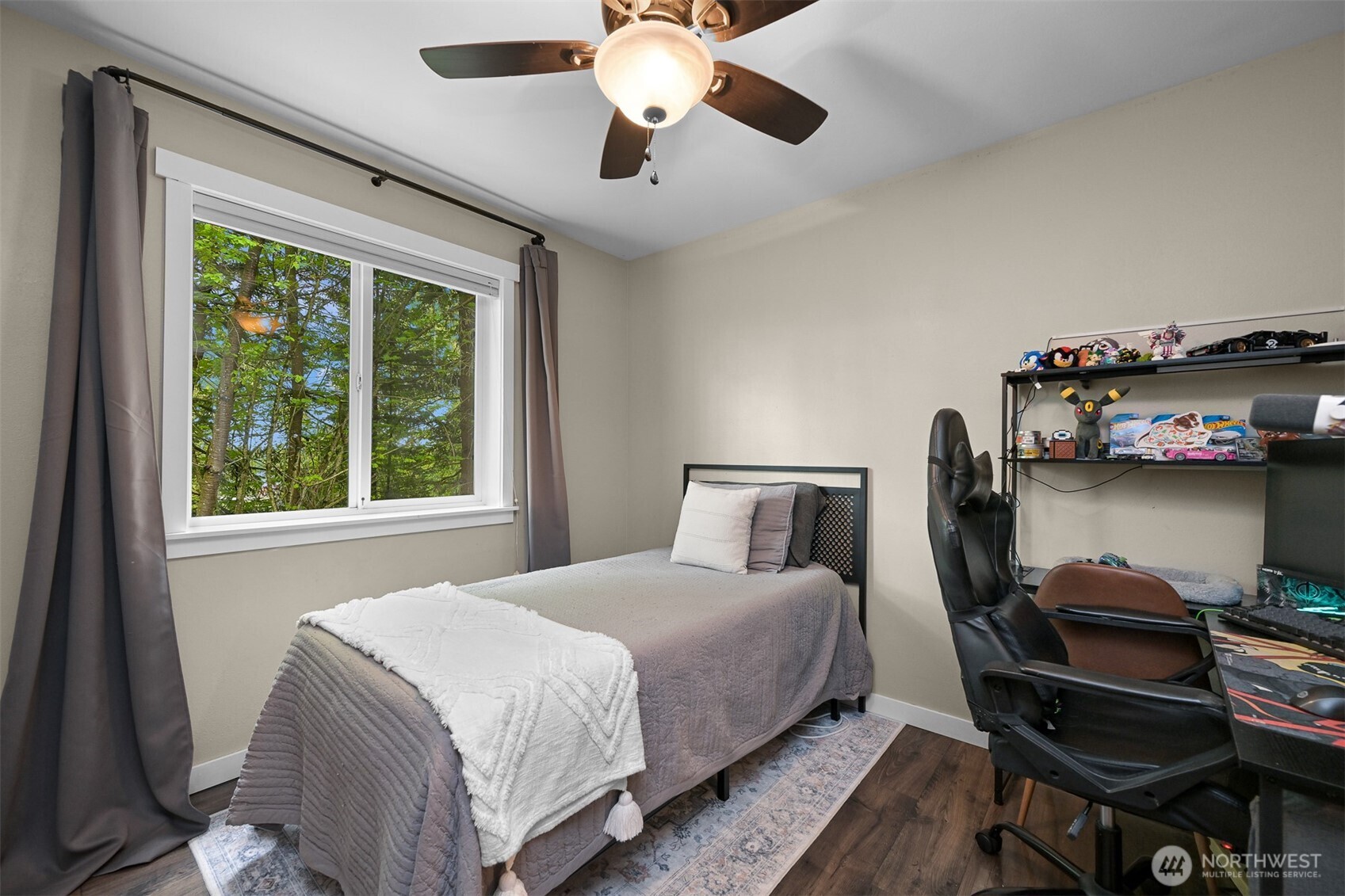 9111 Custer School Road Custer, WA 98240 - Photo 22 of 40 a bedroom with a bed a lamp and a large window