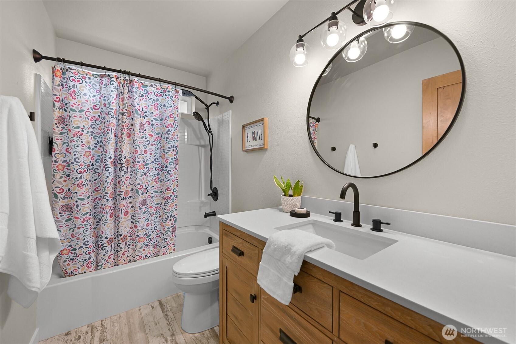 9111 Custer School Road Custer, WA 98240 - Photo 24 of 40 a bathroom with a granite countertop toilet sink and mirror