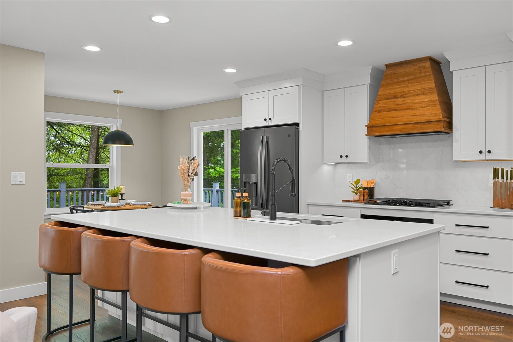 9111 Custer School Road Custer, WA 98240 - Photo 6 of 40 a kitchen with stainless steel appliances granite countertop a table chairs sink and window