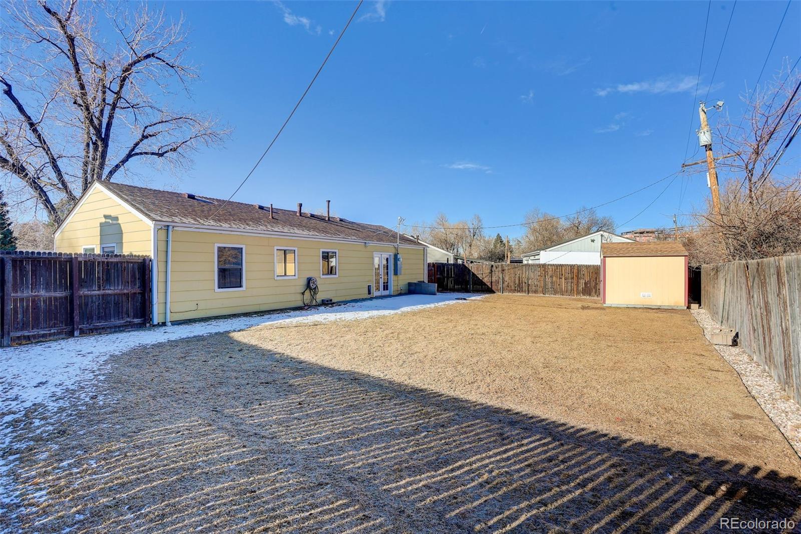 2836 South Grape Way Denver, CO 80222 - Photo 16 of 29 a house with a yard