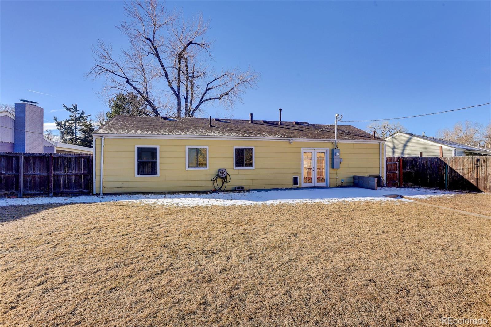 2836 South Grape Way Denver, CO 80222 - Photo 27 of 29 a view of a house with a yard