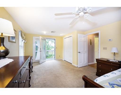 5 Anderson Drive Marshfield, MA 02050 - Photo 16 of 29 a living room with furniture and a flat screen tv