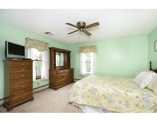 5 Anderson Drive Marshfield, MA 02050 - Photo 19 of 29 a bedroom with a bed and a flat screen tv