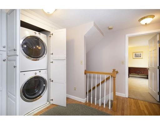 5 Anderson Drive Marshfield, MA 02050 - Photo 21 of 29 a view of a hallway with washer and dryer