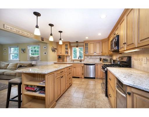 5 Anderson Drive Marshfield, MA 02050 - Photo 6 of 29 a kitchen with granite countertop a sink counter top space appliances and cabinets