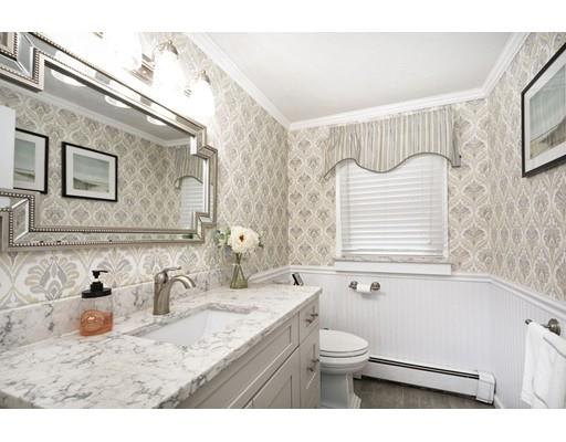 5 Anderson Drive Marshfield, MA 02050 - Photo 9 of 29 a bathroom with a granite countertop bathtub sink vanity mirror and toilet