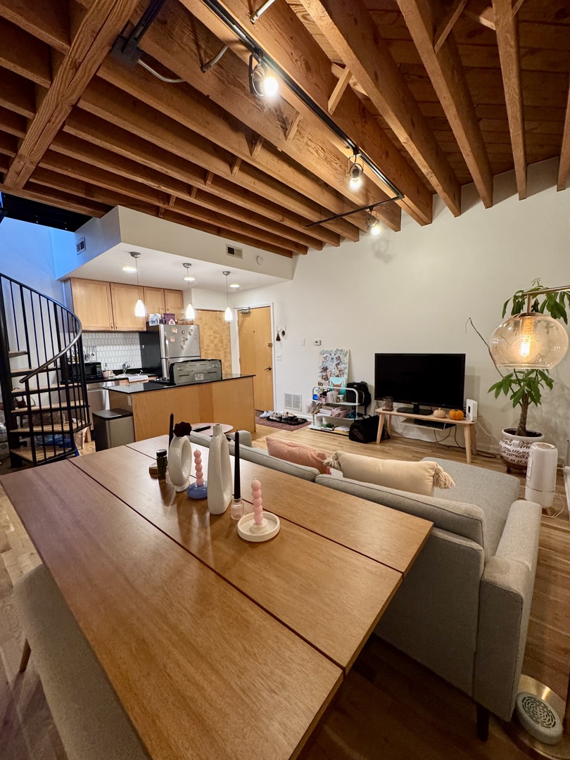 7349 Madison Street, Unit D Forest Park, IL 60130 - Photo 2 of 7 a kitchen with a table and chairs