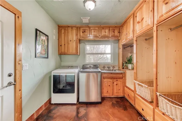 a kitchen with stainless steel appliances granite countertop a stove and a refrigerator