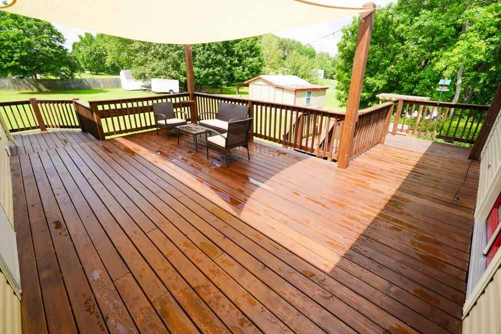 512 Jim McKenzie Road Brighton, TN 38011 - Photo 15 of 20 Step right outside your kitchen or master suite and you'll be able to sip coffee here in the morning or relax with a good book in the afternoon.