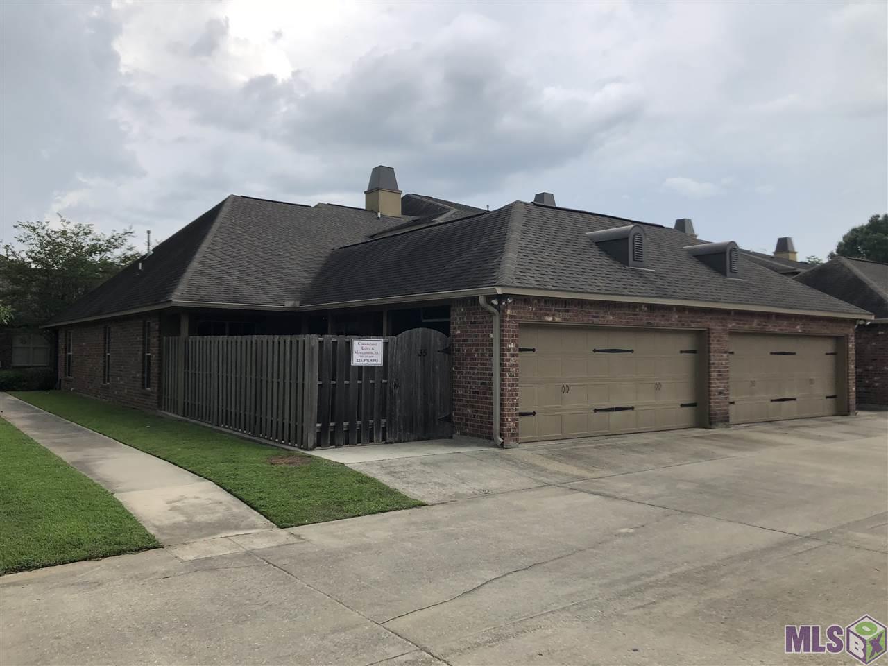 18639 Perkins Road, Unit 35 Prairieville, LA 70769 - Photo 3 of 13 REAR 2 CAR GARAGE