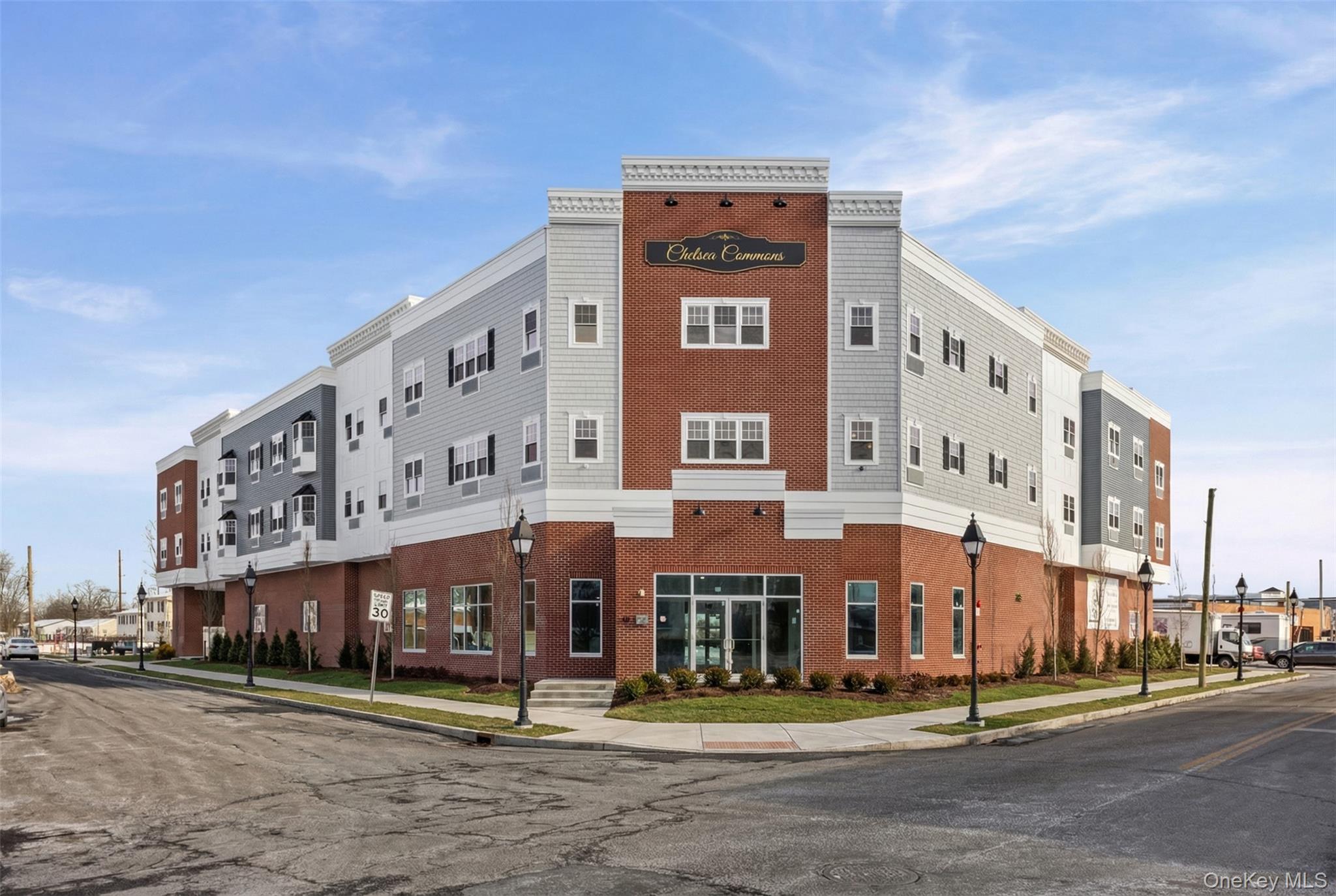 a front view of building with street