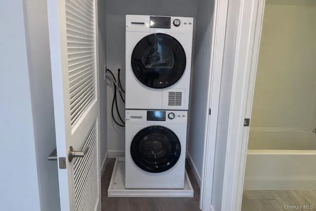 a utility room with dryer and washer