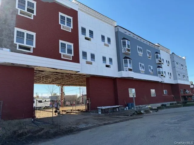 a view of a building with a street
