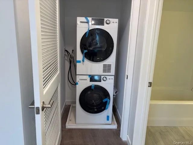 a utility room with dryer and washer