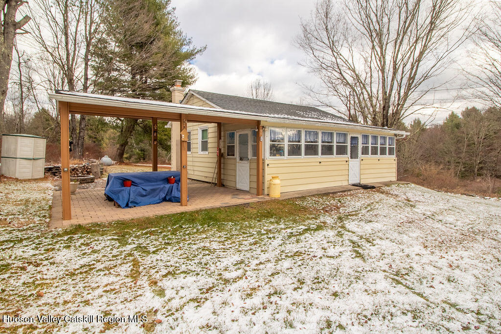 224 Camp Road Ellenville, NY 12428 - Photo 11 of 50 a view of a house with backyard and sitting area