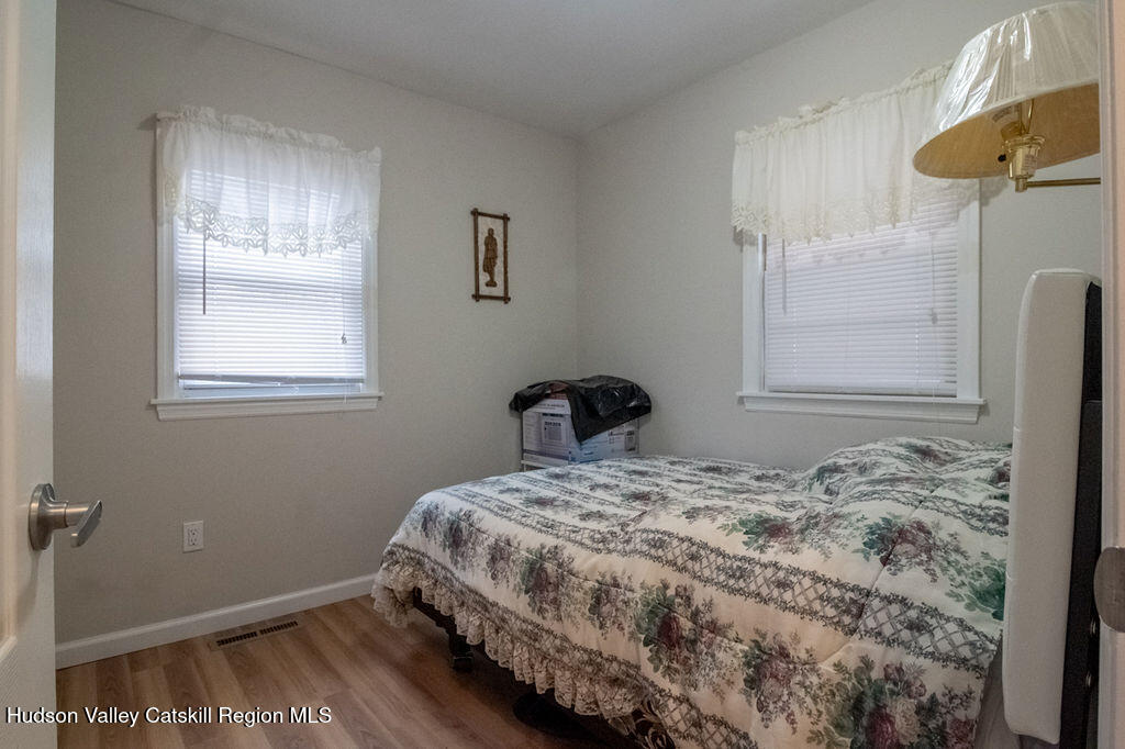 224 Camp Road Ellenville, NY 12428 - Photo 16 of 50 a bedroom with a bed and a window