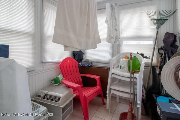 a bathroom with a sink a mirror and shower