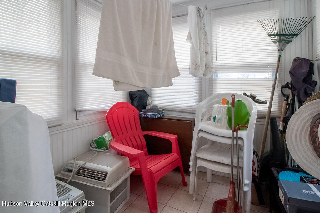 224 Camp Road Ellenville, NY 12428 - Photo 21 of 50 a living room with furniture a window and a table