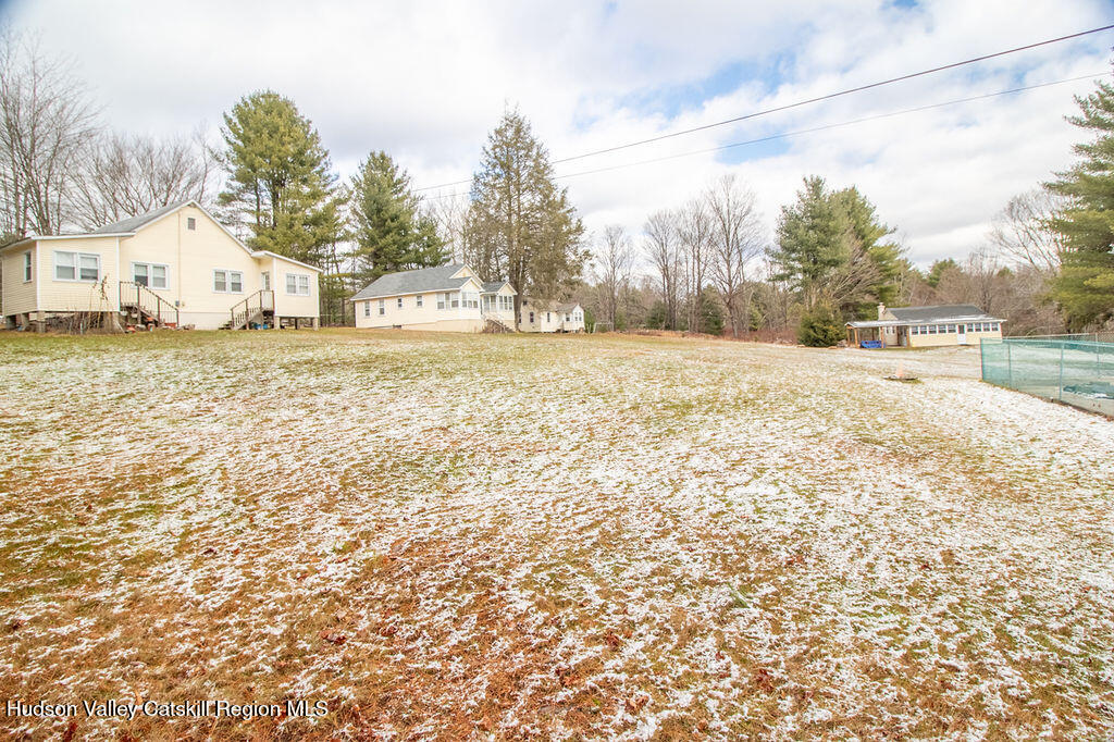 224 Camp Road Ellenville, NY 12428 - Photo 3 of 50 a large white house with a snow on the road