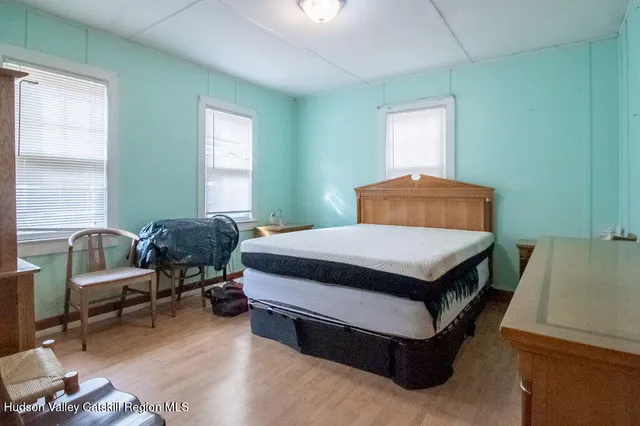 a utility room with cabinets washer and dryer