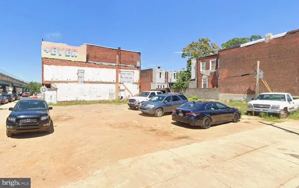 a view of a street with cars