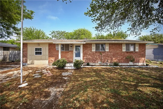 front view of a house with a patio