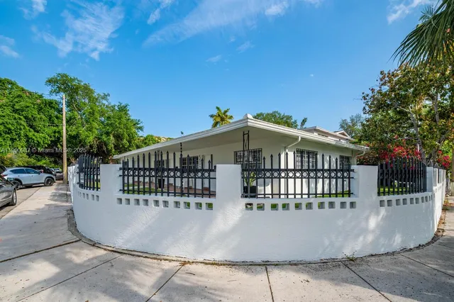 a view of road with large trees