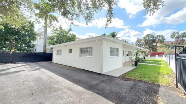 a view of a balcony with a tree