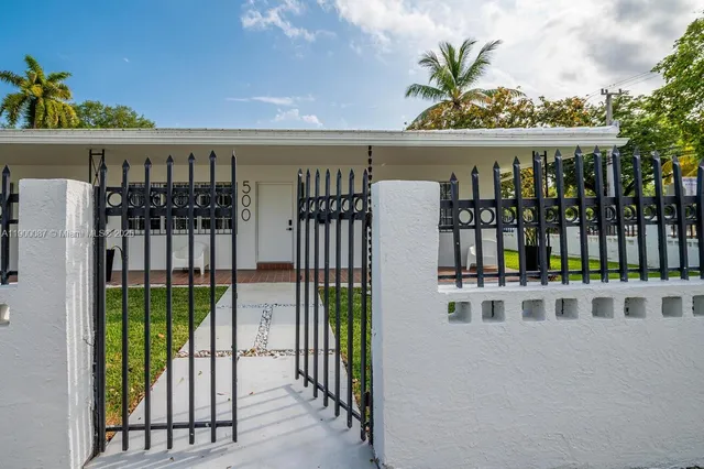 a view of a porch with a garden