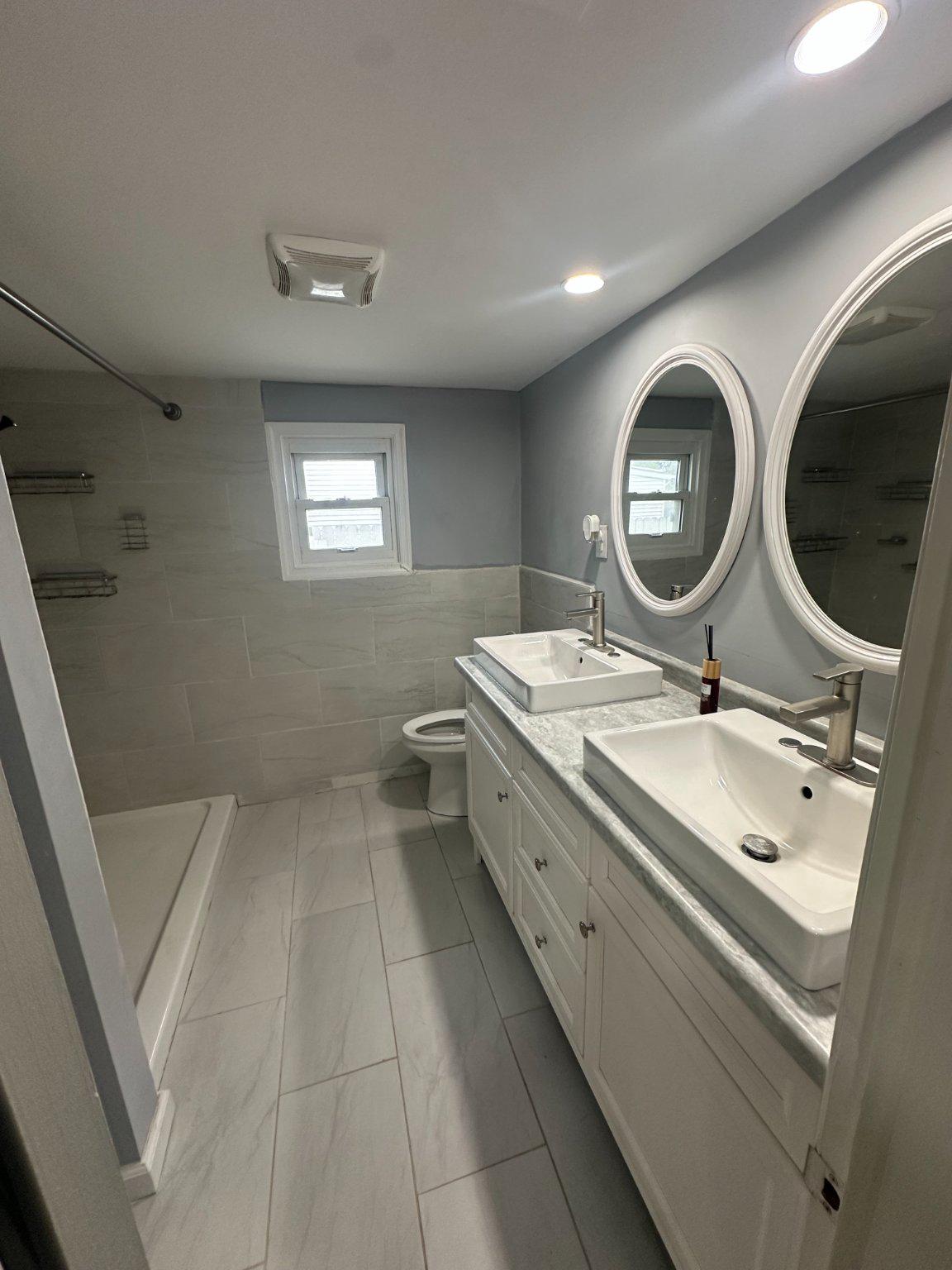 108 Bell Street Dover, DE 19901 - Photo 7 of 16 Sleek modern bathroom with walk in shower.