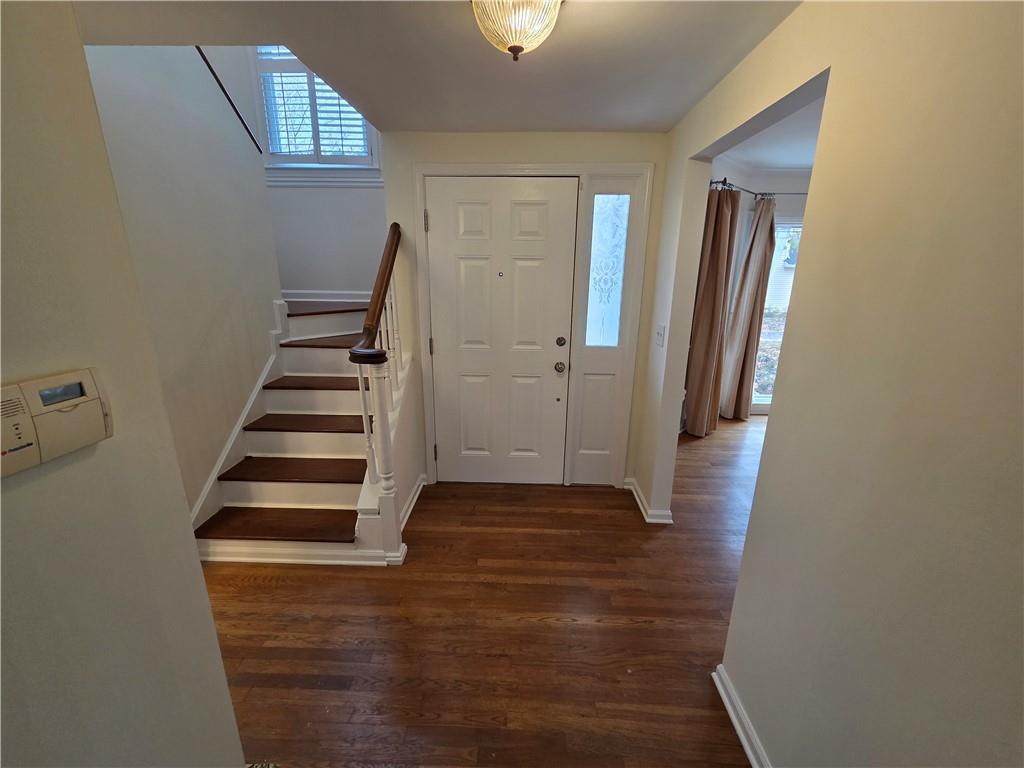 8 Old Decatur Circle Decatur, GA 30030 - Photo 2 of 27 a view of a hallway with wooden floor and entryway