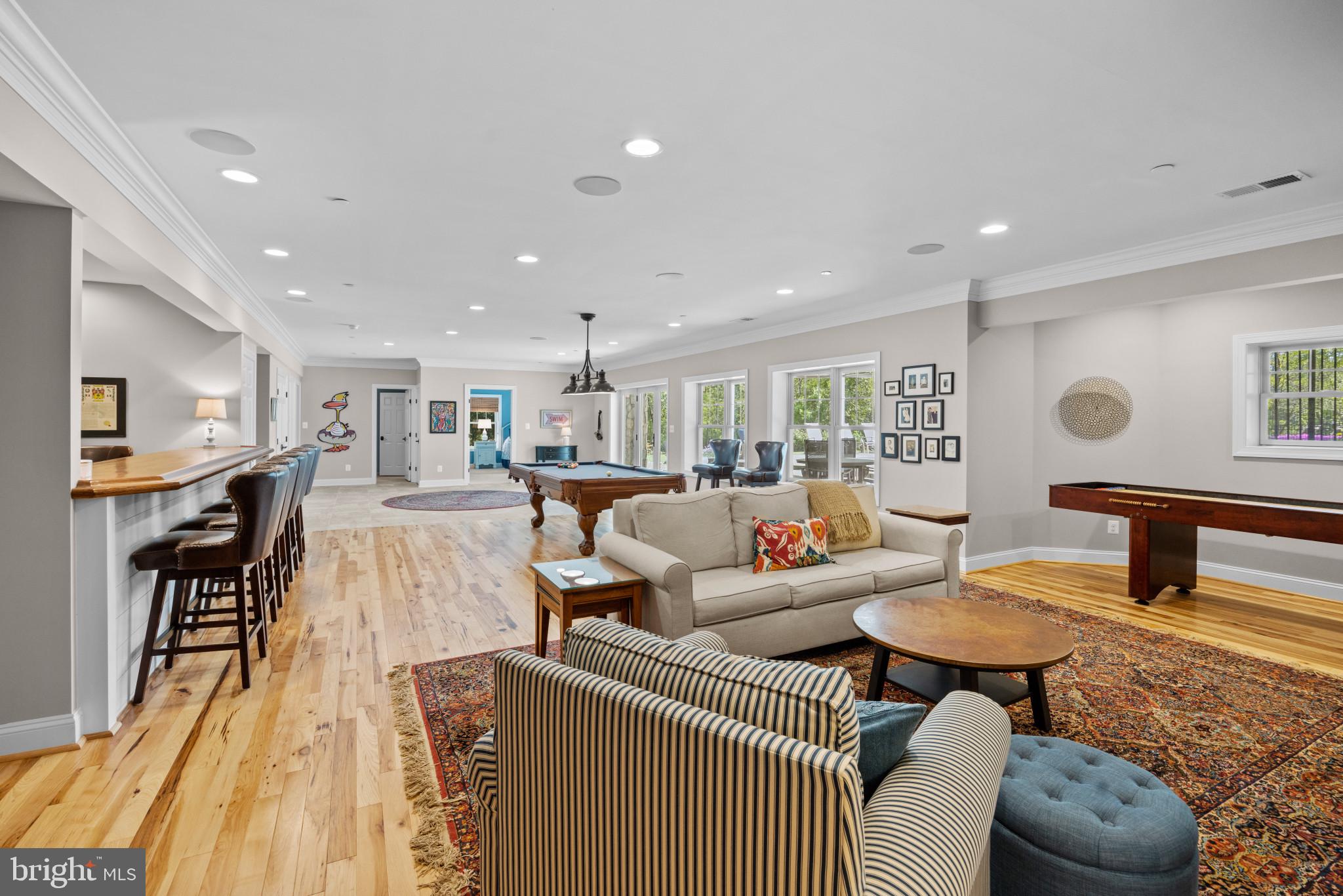 71 Wallace Manor Road Edgewater, MD 21037 - Photo 32 of 49 Lower level rec room with bar