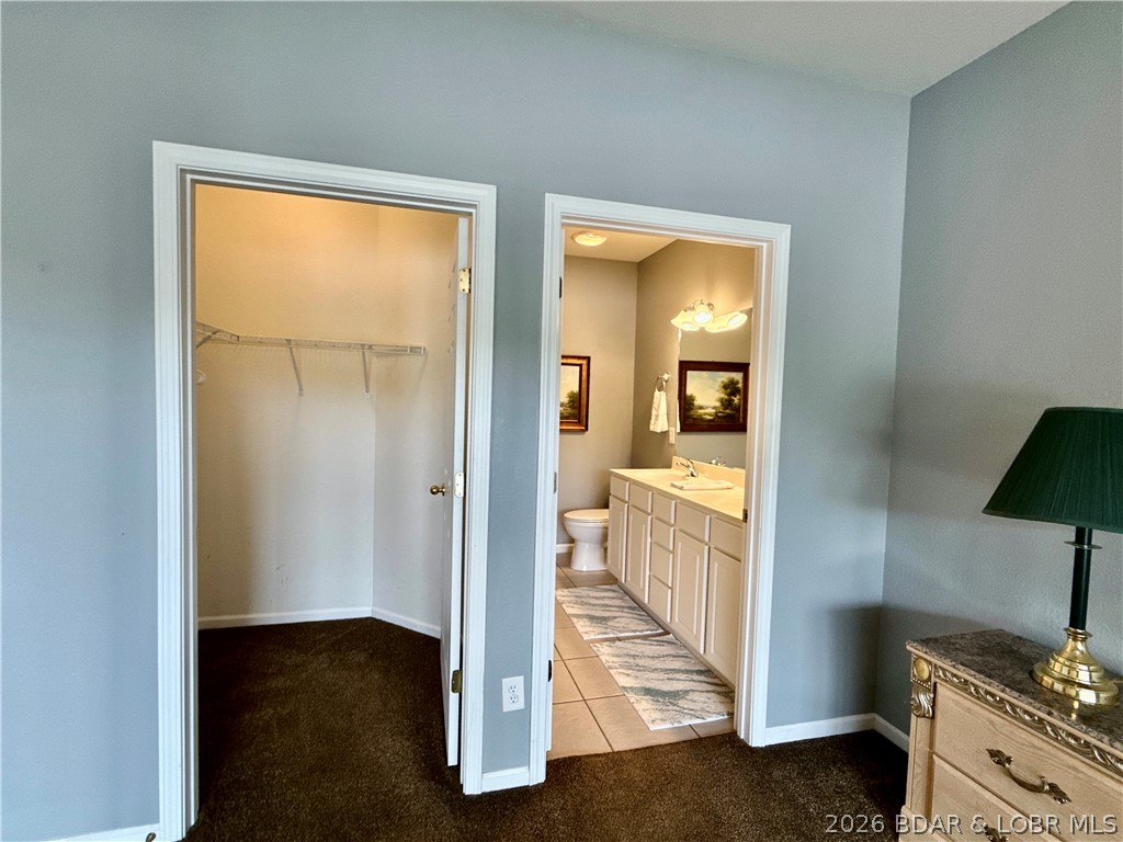 562 Hyd A Way Road, Unit 3E Camdenton, MO 65020 - Photo 13 of 38 Walk in closet in master suite