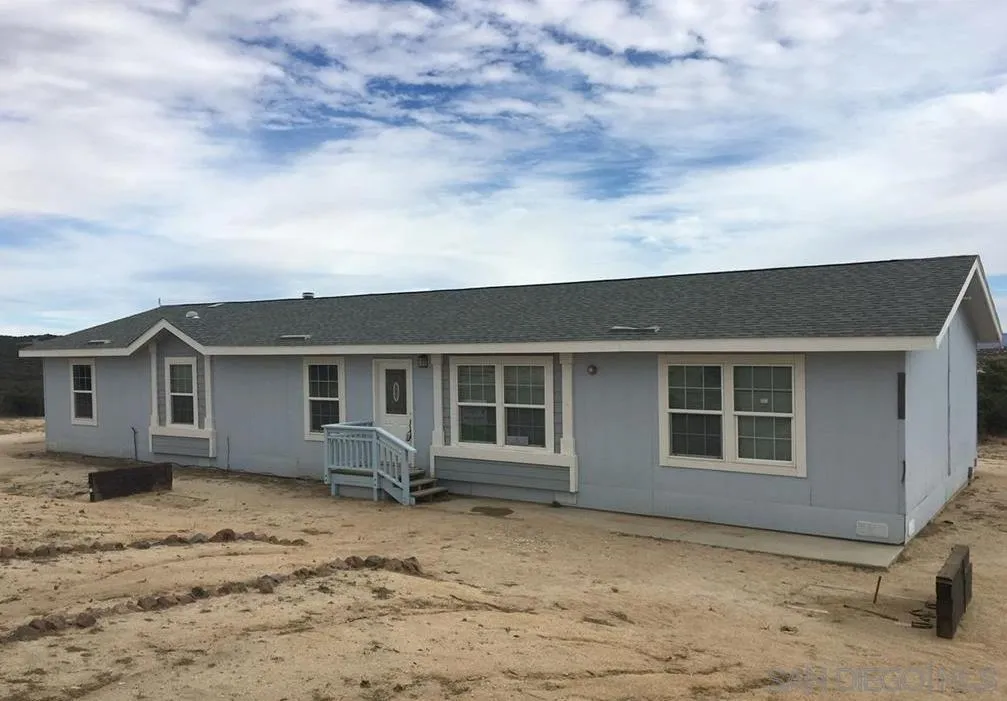 38220 Tierra Real Road Boulevard, CA 91905 - Photo 1 of 1 front view of a house with a yard