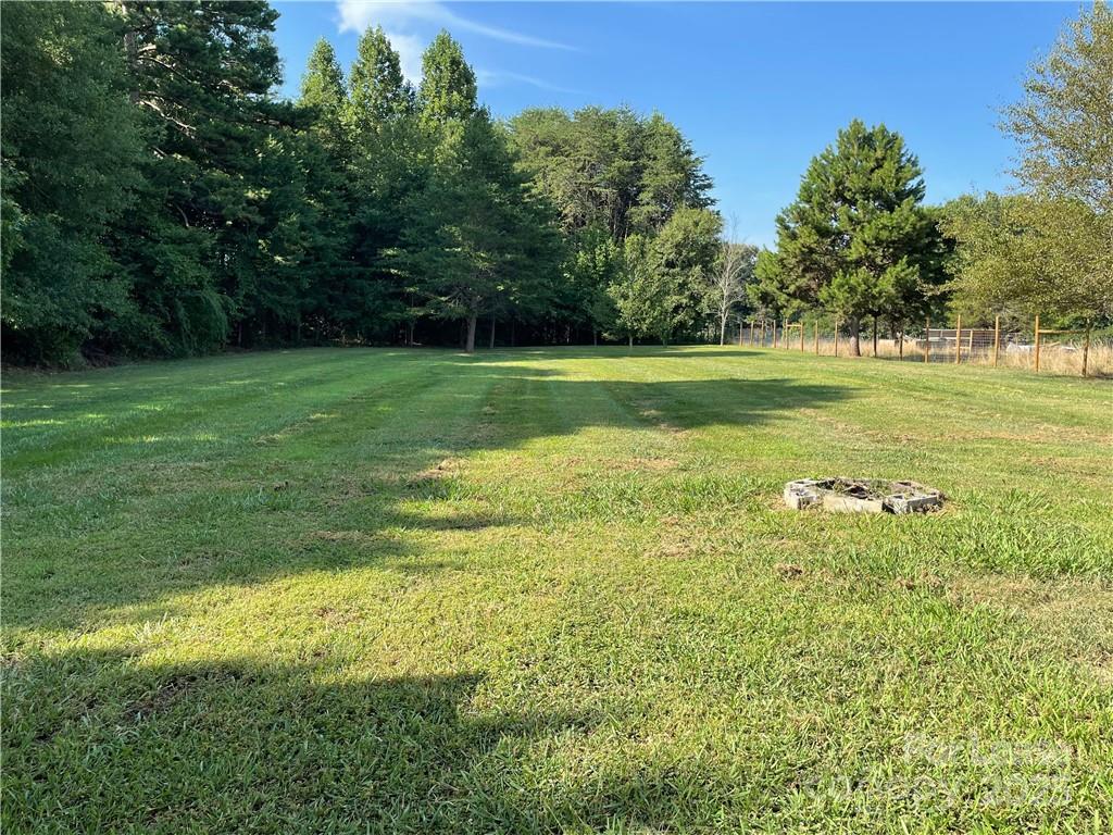 4581 County Home Road, Unit 1 Conover, NC 28613 - Photo 9 of 10 a view of a garden with trees
