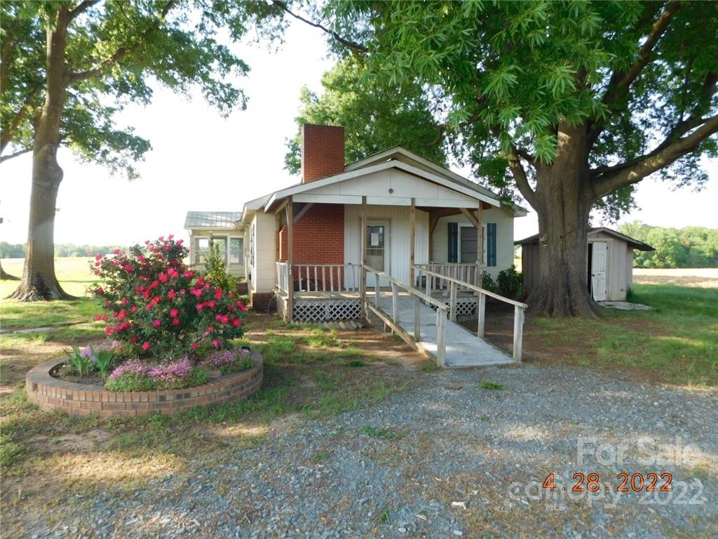 3118 Austin Chaney Road Monroe, NC 28110 - Photo 5 of 15 a view of a house with a yard