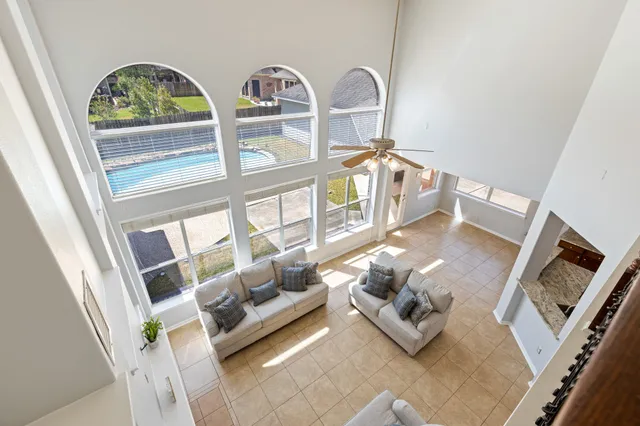 a spacious bathroom with a sink double vanity and a mirror