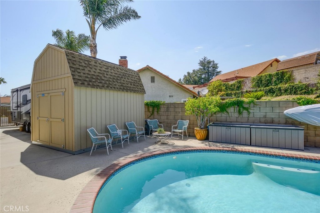 10424 Cartilla Court Rancho Cucamonga, CA 91737 - Photo 32 of 36 a view of a house with backyard and sitting area