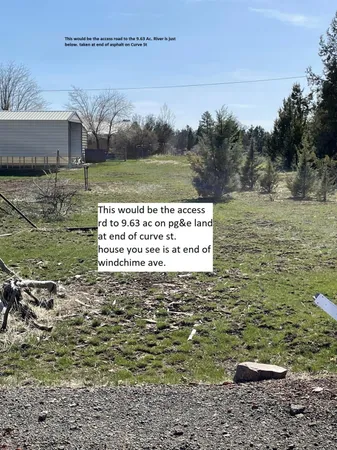 a view of a lake with a yard